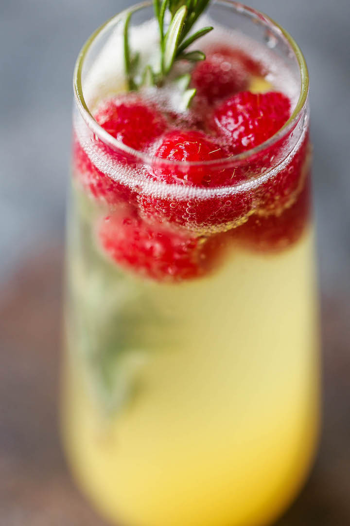 Champagne Punch - A festive cocktail for any occasion that's sure to impress! Unbelievably easy, fruity and refreshing! Can be made non-alcoholic as well.