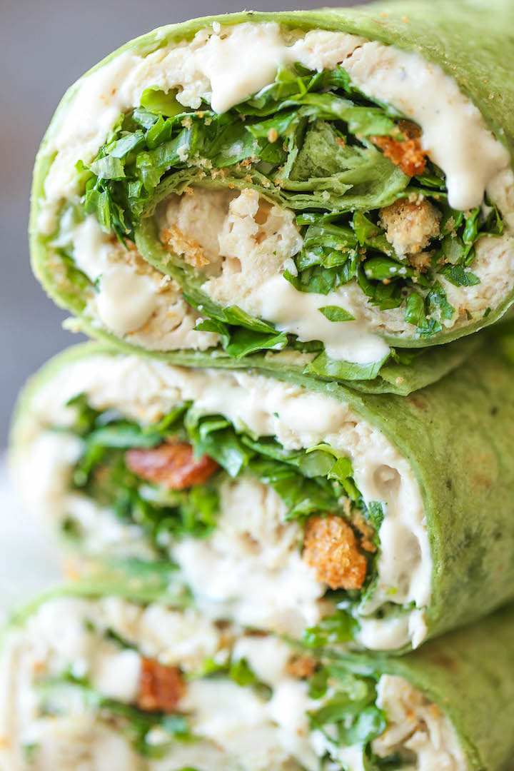 Slow Cooker Chicken Caesar Wraps - Everyone's favorite wrap made right in the slow cooker! The chicken is so tender, juicy and melt-in-your-mouth amazing!