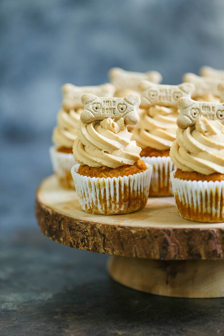 
Peanut Butter Pupcakes - Treat your pup with these dog-friendly cupcakes filled with pumpkin, applesauce and carrots topped with a peanut butter frosting!