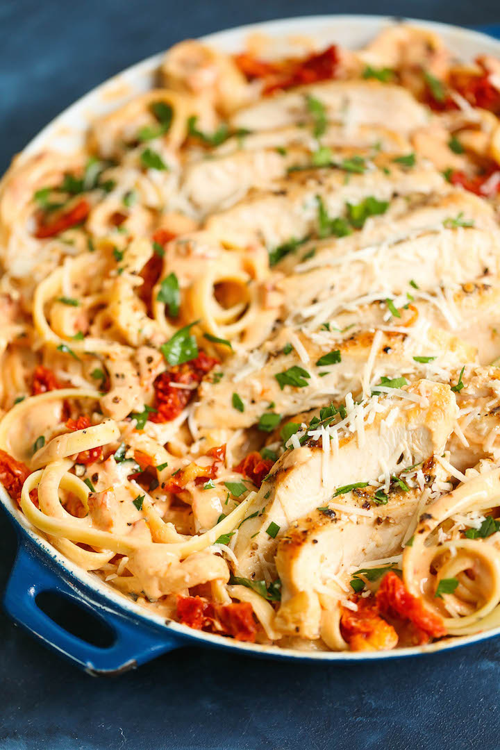 Sun-Dried Tomato Fettuccine Alfredo - The most AMAZING cream sauce that just melts in your mouth. Made LIGHTER, except you can't even taste the difference!
