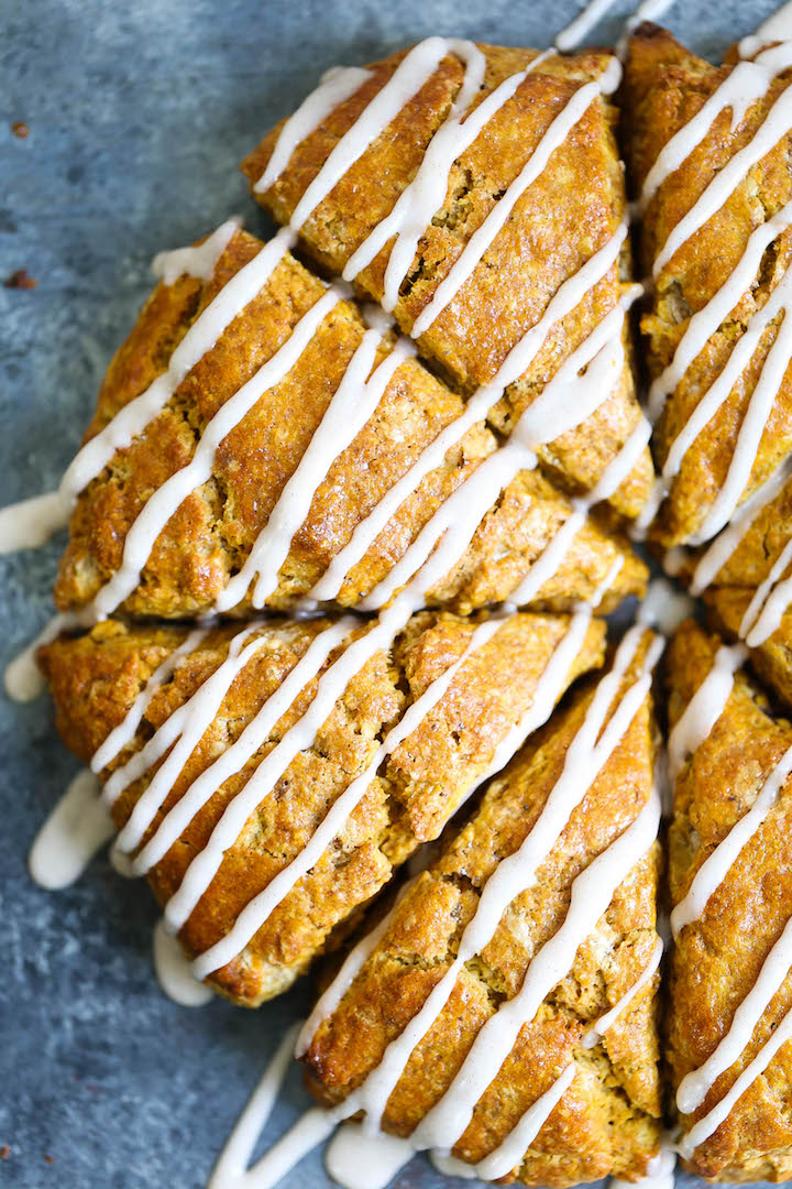 Pumpkin Spice Latte Scones - The most perfectly spiced pumpkin scones!  It basically tastes like a pumpkin spice latte, except with a cinnamon glaze drizzle!