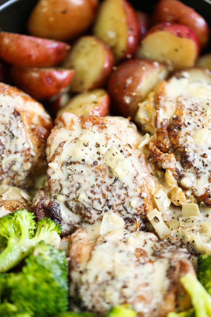 Slow Cooker Creamy Garlic Chicken and Veggies - A one pot crockpot meal! Tender chicken, potatoes and broccoli! Served with the creamiest garlic sauce ever!