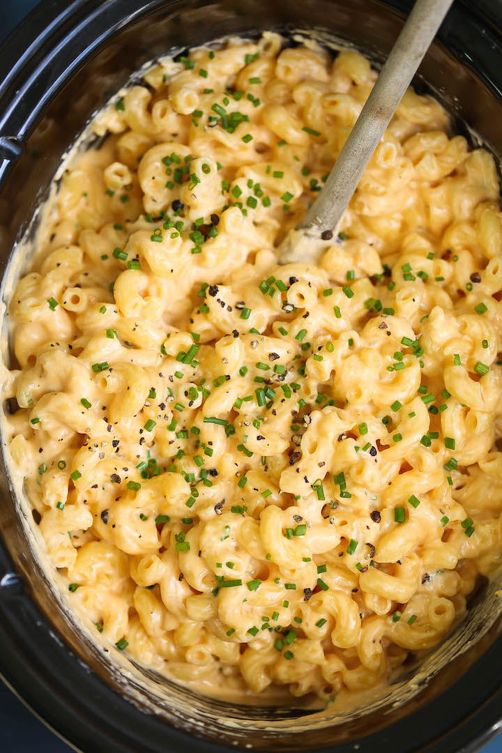 Slow Cooker Four Cheese Mac and Cheese - The BEST mac and cheese EVER!!!! No boil. No stress. Everything gets thrown right in. Even the uncooked noodles!!!