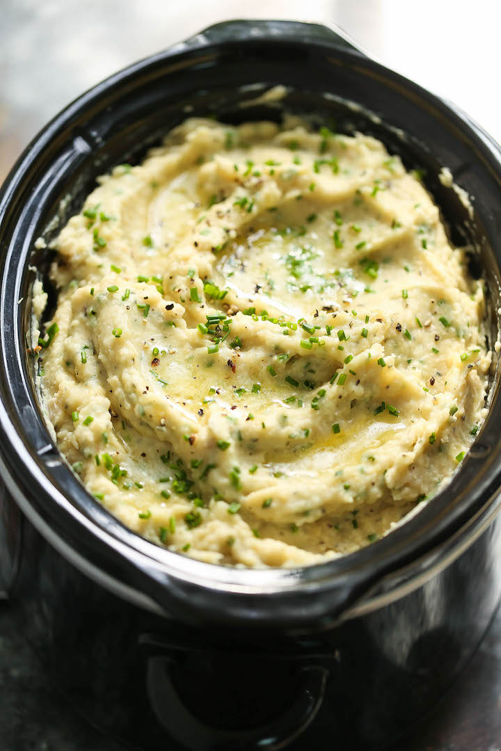 Slow Cooker Cauliflower Mashed Potatoes - BEST EVER mashed potatoes made right in your crockpot! Save on oven space! You won't even taste the cauliflower!