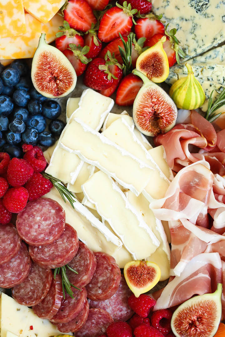 The Perfect Holiday Cheese Board - Learn how to assemble the most beautiful cheese and charcuterie board ever for a crowd! Only 10 min prep. So easy, right?