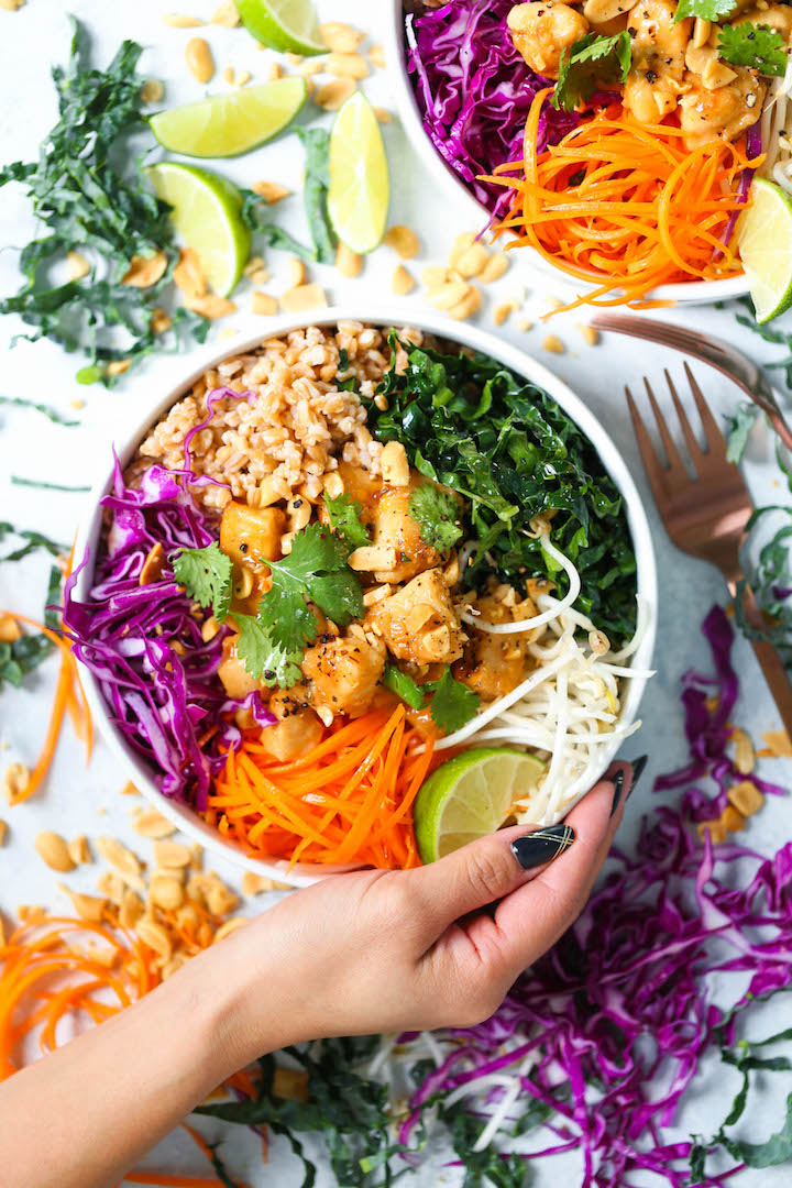 Thai Chicken Buddha Bowls - Healthy, hearty and nutritious bowls filled with whole grains, plenty of veggies, and a simple peanut sauce that is absolutely to die for!
