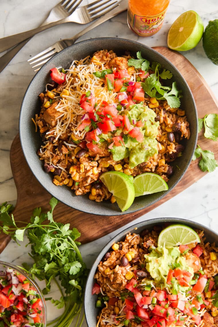 Instant Pot 20 Minute Chicken Burrito Bowls - Comes together in less than 10 min prep! The chicken is so tender and the flavors are so good.