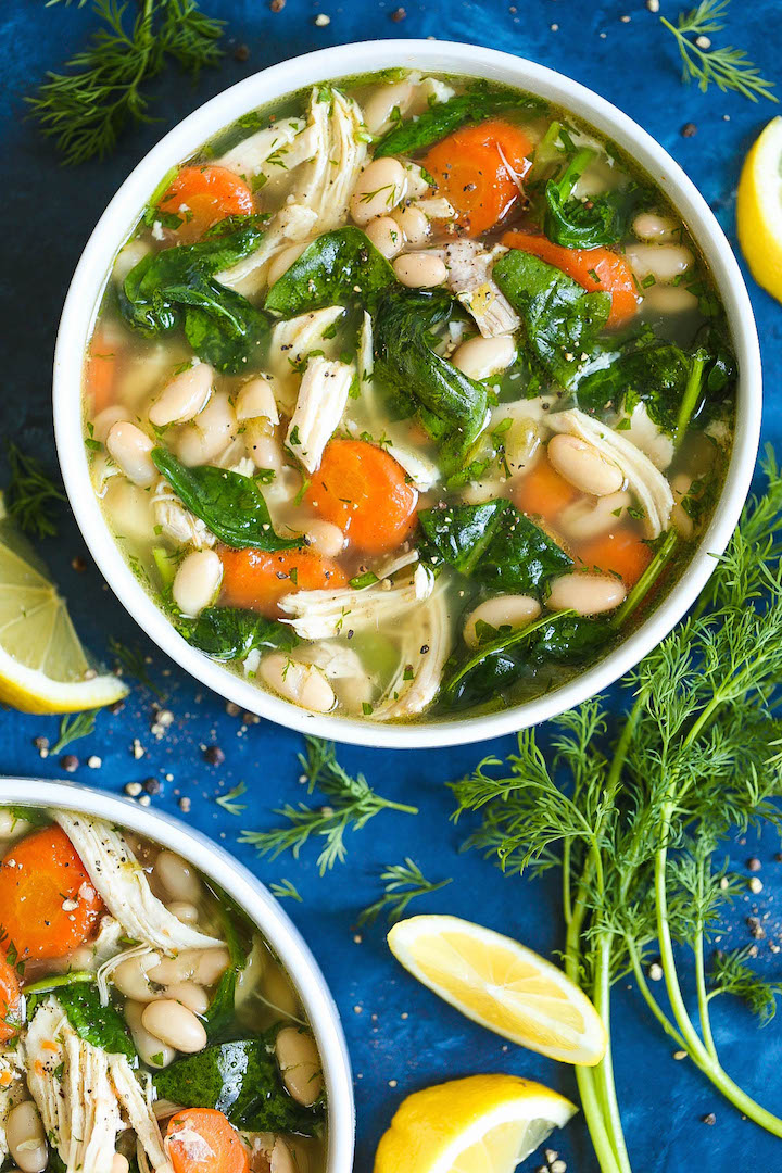 Greek Lemon Chicken Soup - A quick and easy 30 minute chicken soup - so cozy and comforting! We swap out the noodles for cannellini beans for added protein and fiber with way less calories! And the added lemon juice is so refreshing and vibrant!