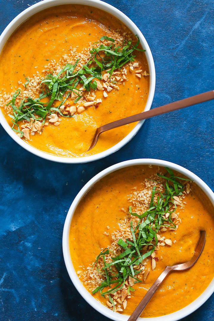Thai Sweet Potato and Carrot Soup - A Thai-inspired soup that is incredibly light, healthy, hearty and cozy! It is so easy to make using baby carrots, sweet potatoes, lite coconut milk and lime juice. It is packed with SO MUCH FLAVOR!