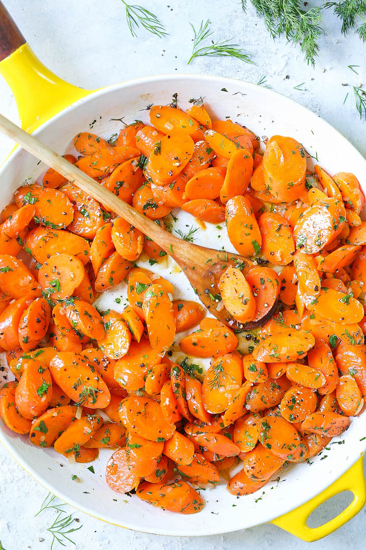 Garlic Herb Carrots - This quick and easy side dish comes out perfectly every single time. The carrots come out amazingly garlicky, buttery and slightly sweet, tossed with fresh dill, parsley and tarragon. It is so simple yet it is elegant enough for any occasion!