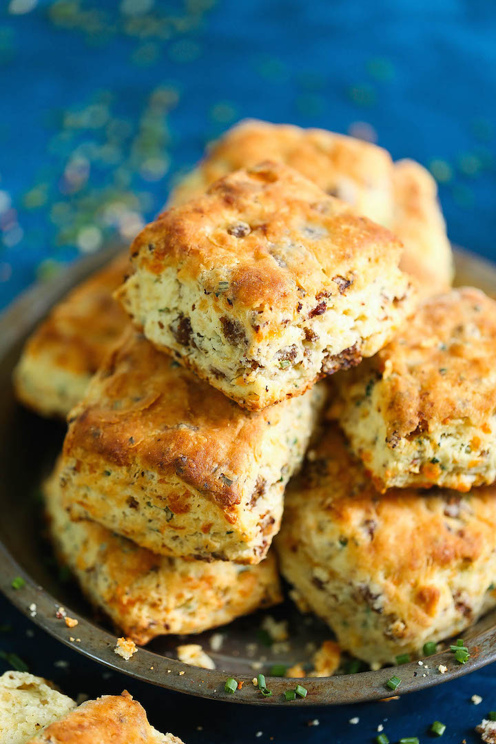 Sausage Cheese Biscuits - The most amazing breakfast biscuits ever! Loaded with fresh crumbled sausage chunks, sharp cheddar cheese and green onions. You will want this for breakfast every single morning!