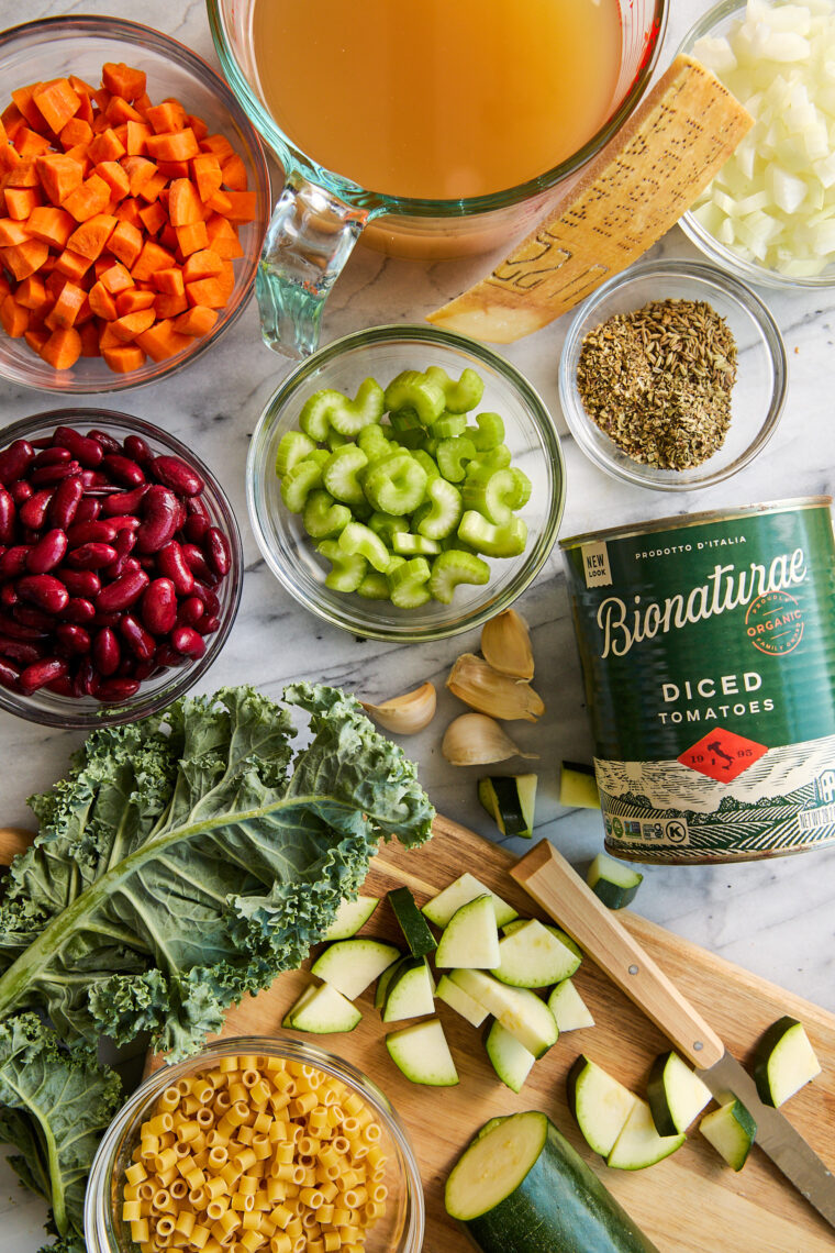 Instant Pot Minestrone Soup - So cozy, so hearty! Loaded with vegetables, beans, pasta + Parmesan rind for extra flavor. Vegetarian-friendly!