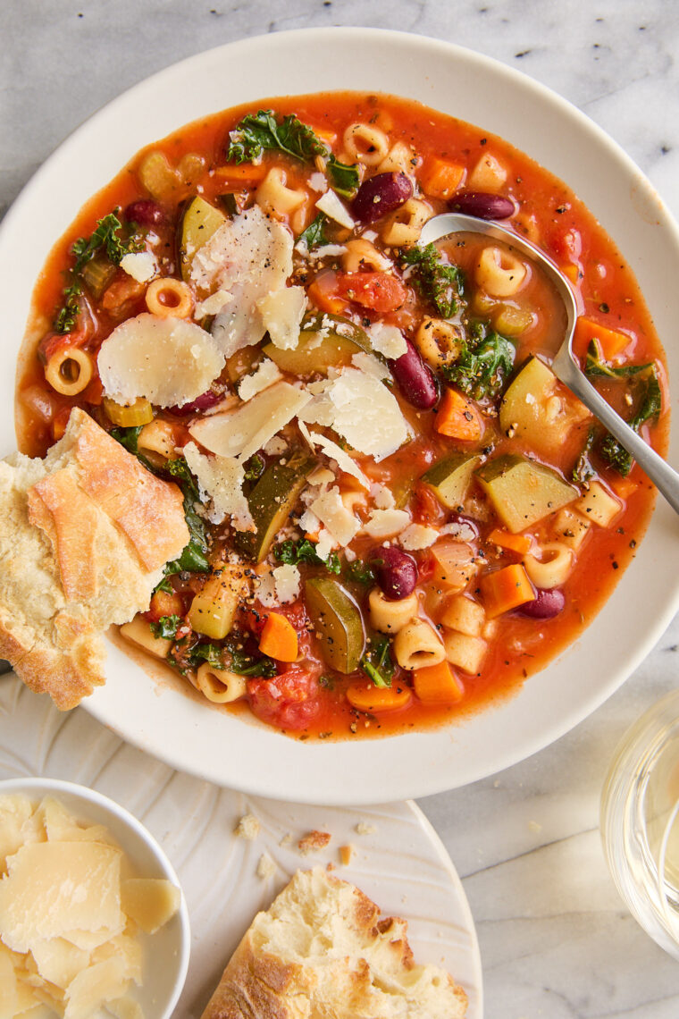 Instant Pot Minestrone Soup - So cozy, so hearty! Loaded with vegetables, beans, pasta + Parmesan rind for extra flavor. Vegetarian-friendly!