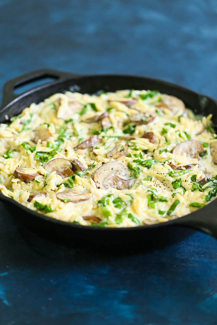 Creamy Mushroom Spinach Orzo - This creamy, hearty orzo dish makes for the best vegetarian side dish ever! Loaded with mushrooms, spinach and freshly grated Parmesan cheese for the most amazing garlic Parmesan cream sauce. You can also add chicken and turn this into a main dish!