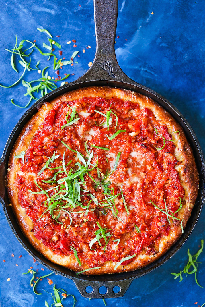 Deep Dish Chicago Style Pizza - Now you don't have to go all the way to Chicago for a deep dish pizza! The crust is perfectly golden brown, the chunky tomato sauce is completely homemade, and a fresh layer of ooey gooey mozzarella cheese is simply the best combination ever!