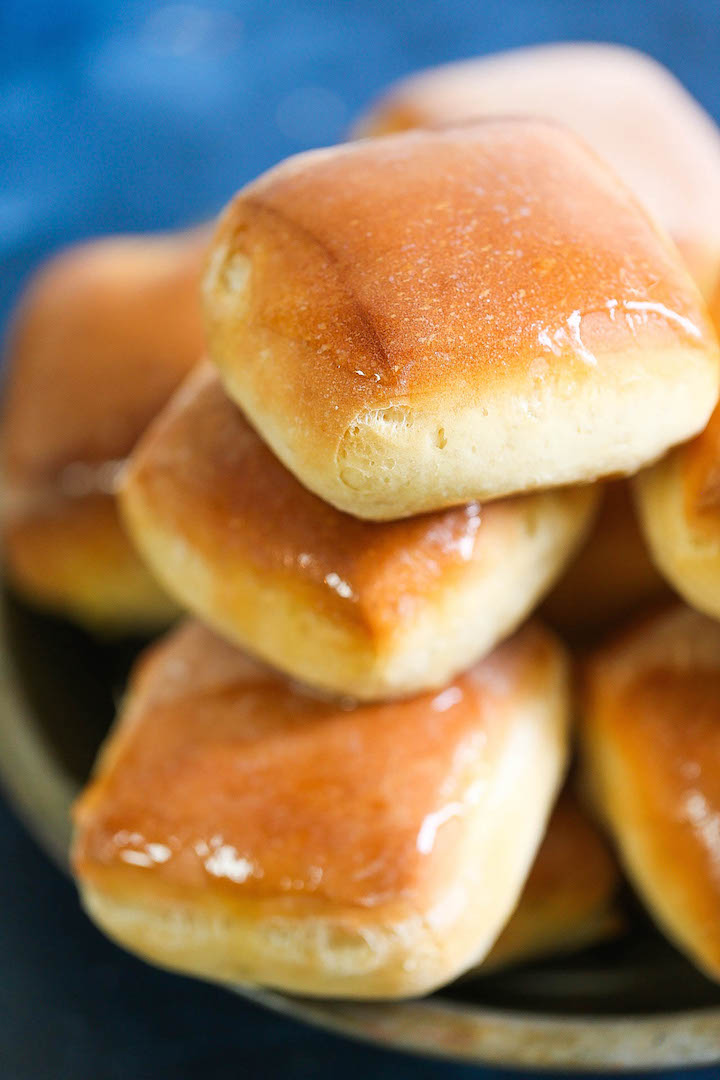 Texas Roadhouse Rolls - Everyone's FAVORITE copycat Texas roadhouse rolls! Yes, you can make them right at home completely from scratch and it is SO MUCH BETTER! It's so amazingly buttery and fluffy! You will only want the homemade version after this!