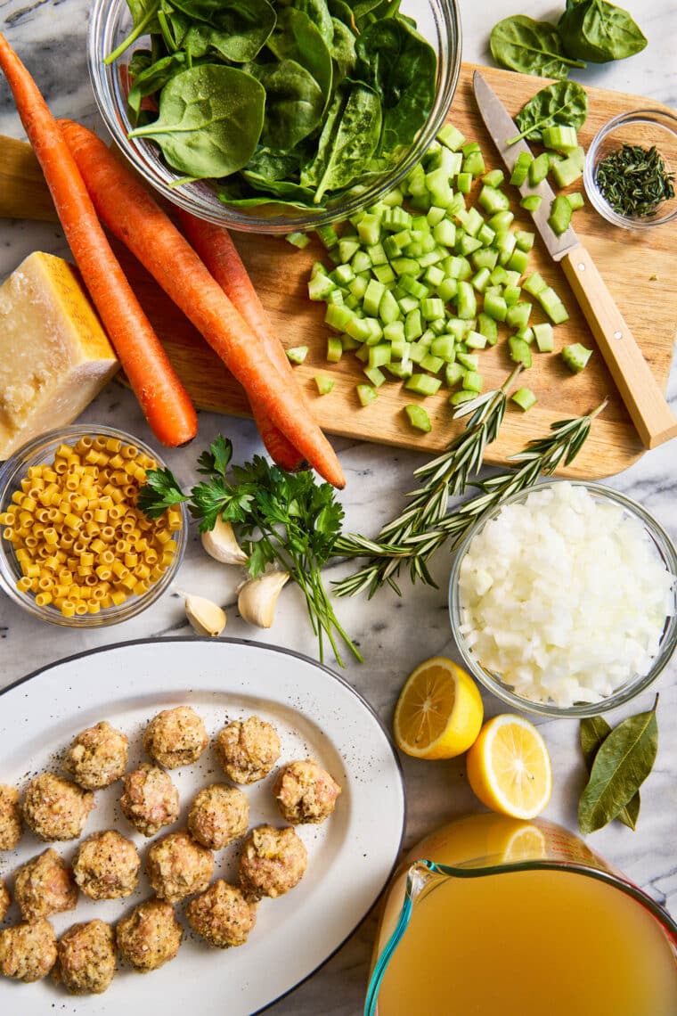 Italian Wedding Soup - Simple, quick and easy with homemade tender, juicy, chicken meatballs, hearty veggies and pasta. Freezer-friendly too!