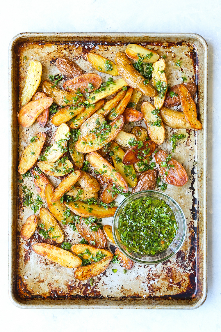 Baked Garlic Herb Potato Wedges - The crispiest potato wedges ever (COMPLETELY BAKED!). Served with the most amazing, garlicky-herb mixture!