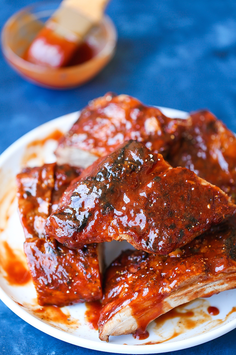 Easy Instant Pot BBQ Ribs - The easiest and quickest BBQ ribs made right in your pressure cooker! So saucy, sticky, and tender, it just falls off-the-bone!