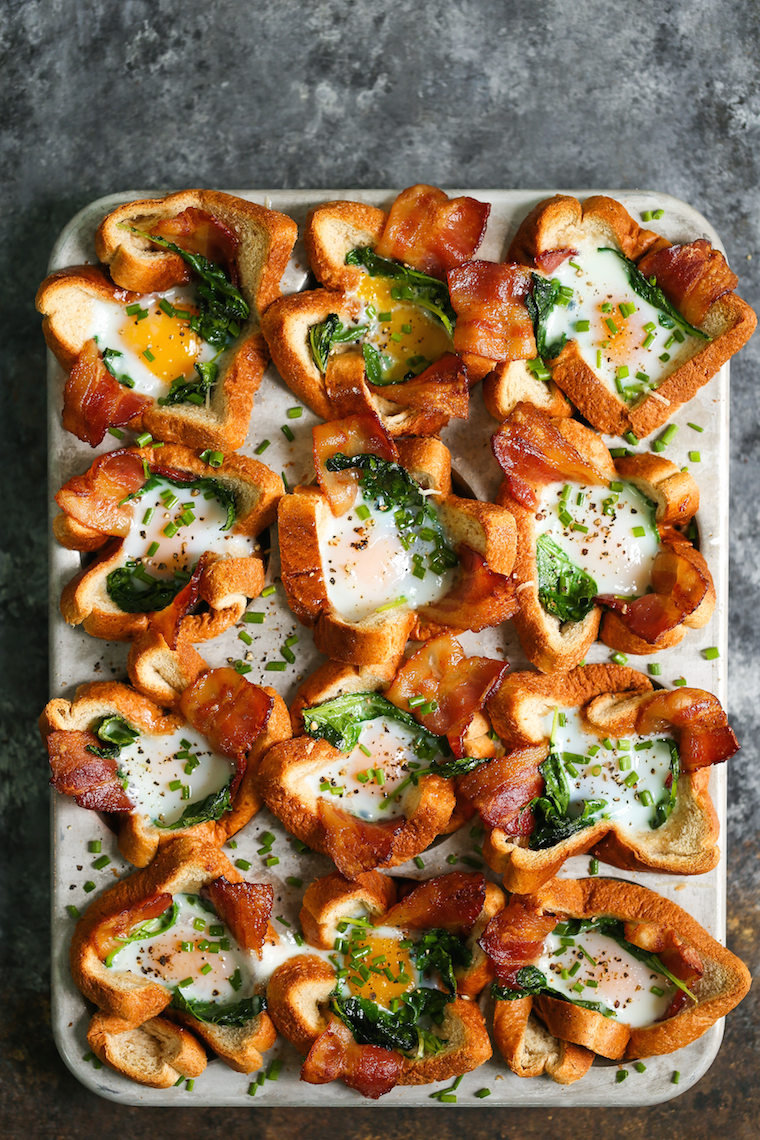 Bacon and Egg Toast Cups - The classic American breakfast all into one muffin! Just layer the bread, bacon and eggs. They are sure to be a crowd-pleaser!