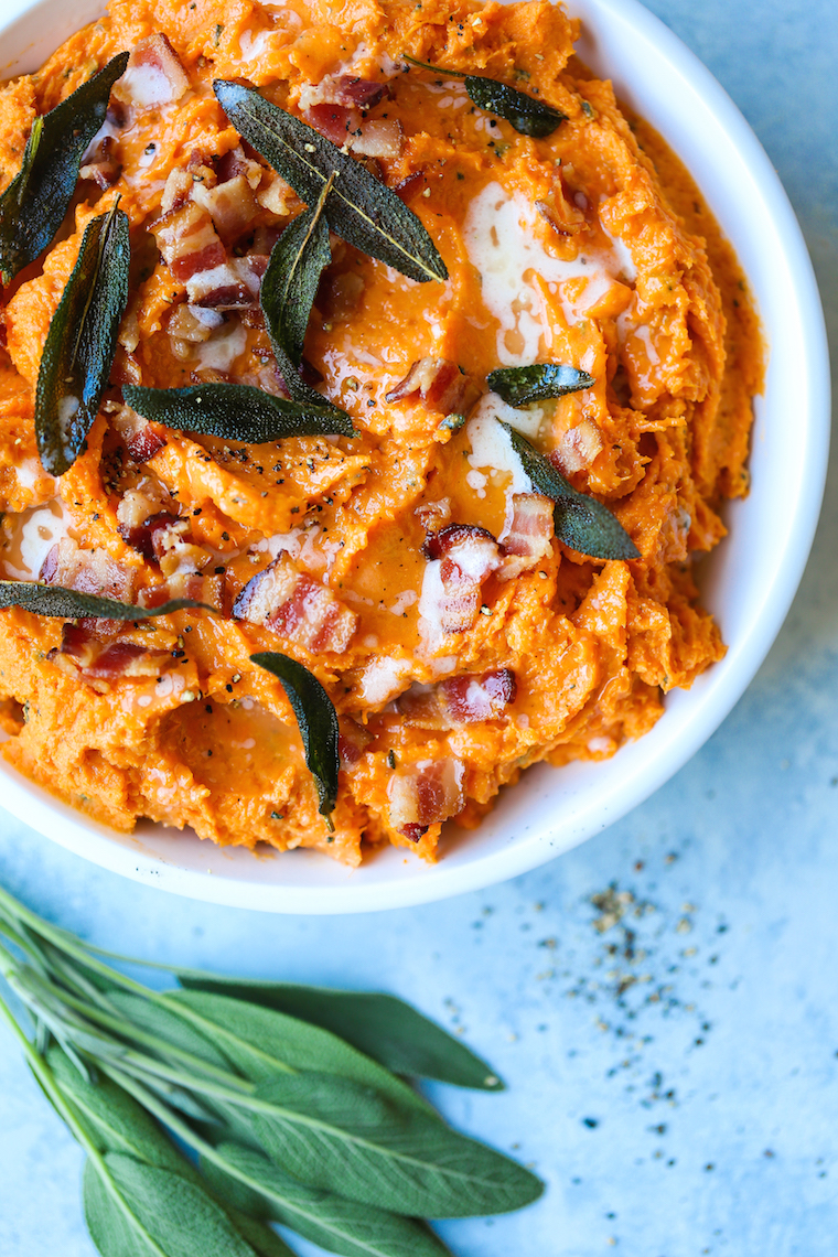Mashed Sweet Potatoes - This is an absolute must for your Thanksgiving holiday menu! It's so easy and so good with the sage-butter and crisp bacon bits!