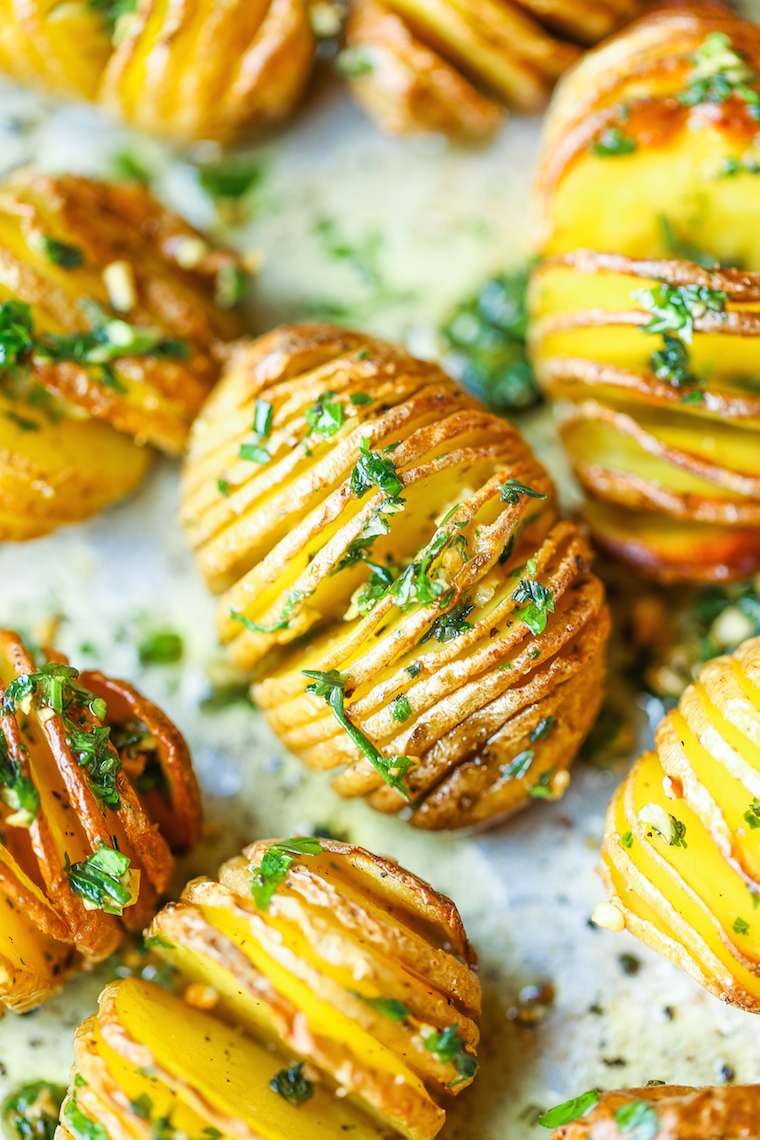 Mini Hasselback Potatoes - Crisp-tender, garlicky, herb hasselback potatoes make for the perfect side dish! And they're mini so it makes for easy serving!