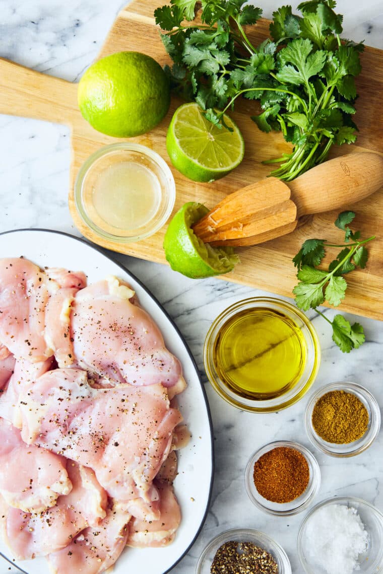 Cilantro Lime Chicken Thighs - Truly the most AMAZING zesty cilantro-lime marinade ever! The chicken comes out perfectly juicy and so tender.