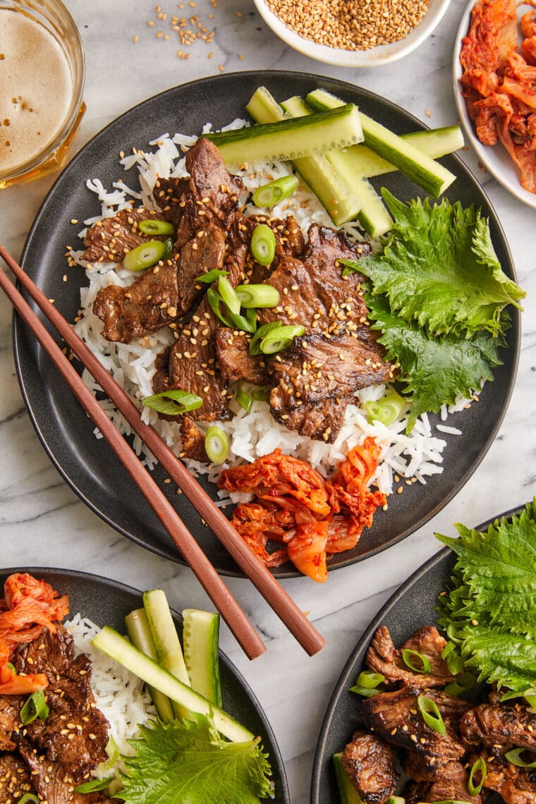 Korean Beef Bulgogi - A super easy recipe for Korean BBQ with the most flavorful marinade! The thin, tender slices of meat cook SO quickly!