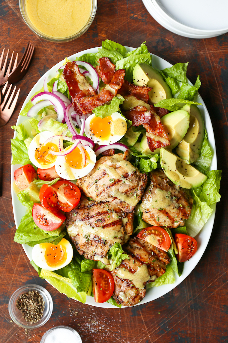 Grilled Chicken Cobb Salad - No more boring cobb salads! Made with the juiciest garlic rosemary chicken thighs and the most flavorful honey Dijon dressing!