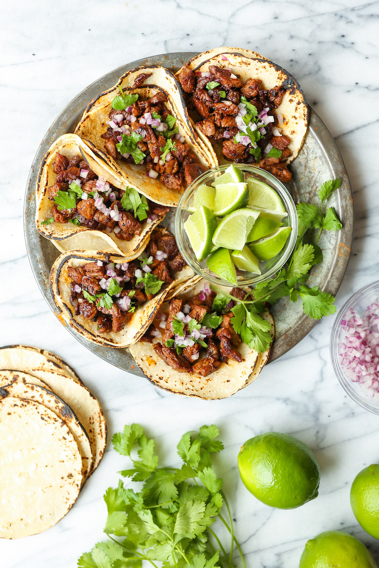 Mexican Street Tacos - Easy, quick, authentic carne asada street tacos you can now make right at home! Top with onion, cilantro + fresh lime juice! SO GOOD!