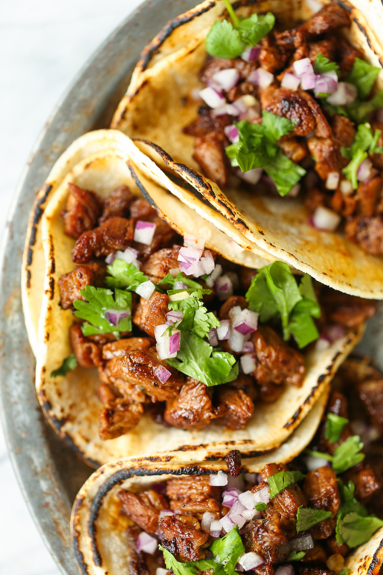 Mexican Street Tacos - Easy, quick, authentic carne asada street tacos you can make right at home! Top with onion, cilantro and lime juice!