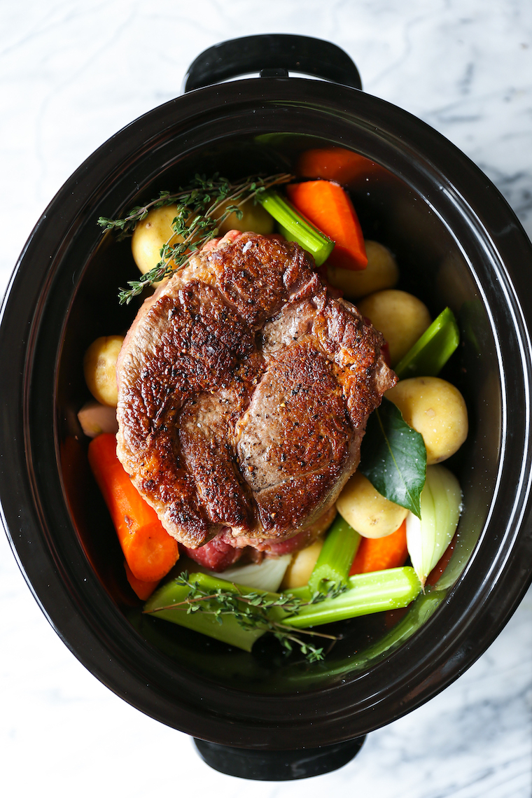 Slow Cooker Pot Roast Recipe - No-fuss, amazingly fall-apart pot roast made in your crockpot with the most tender vegetables!