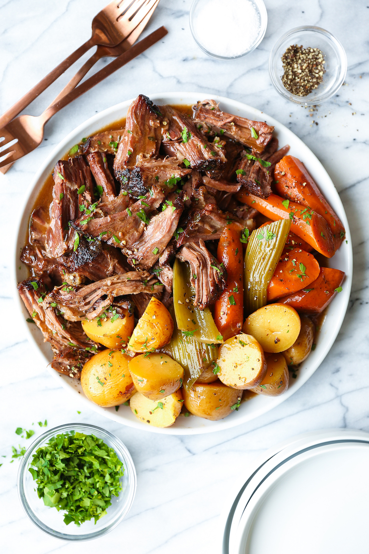 Slow Cooker Pot Roast - No-fuss, amazingly fall-apart pot roast made in your crockpot with the most tender vegetables! And the gravy is simply perfection.