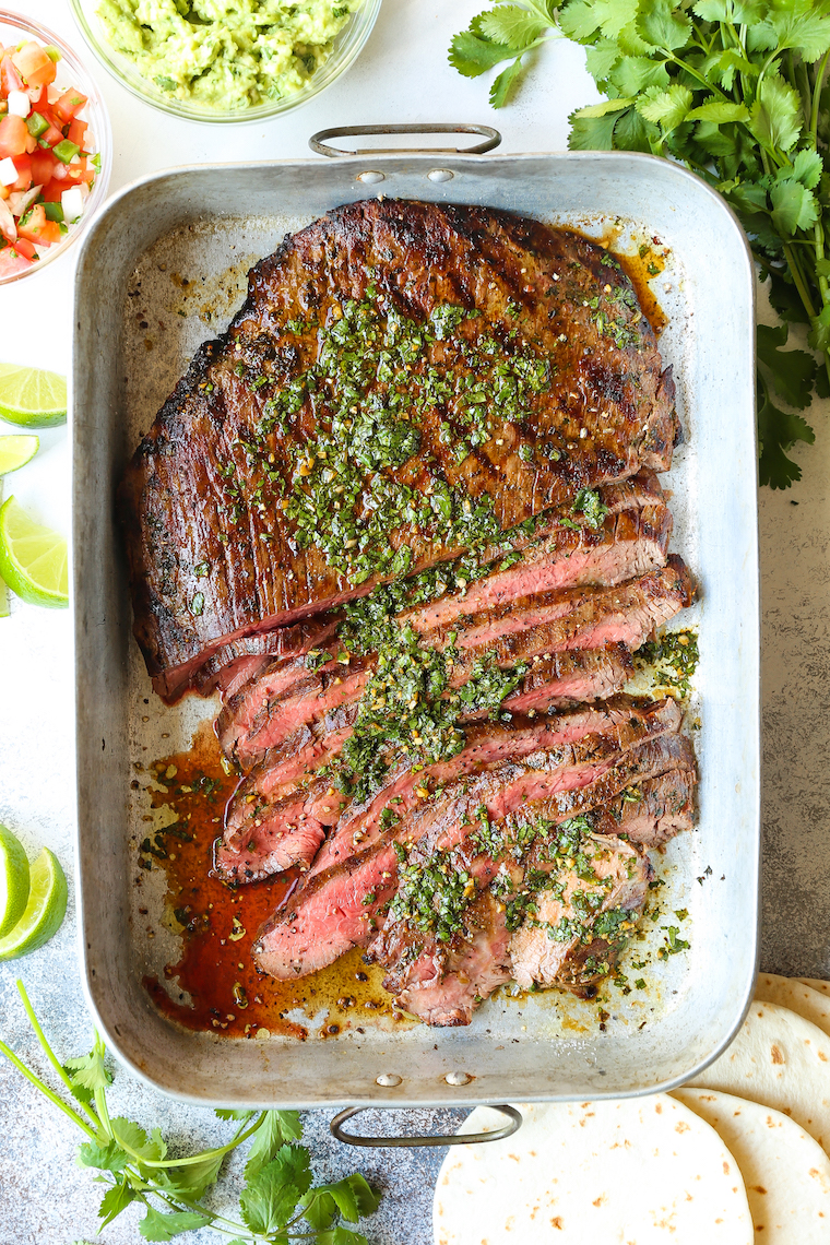 Slow Cooker Flank Steak and Peppers - Deliciously Seasoned