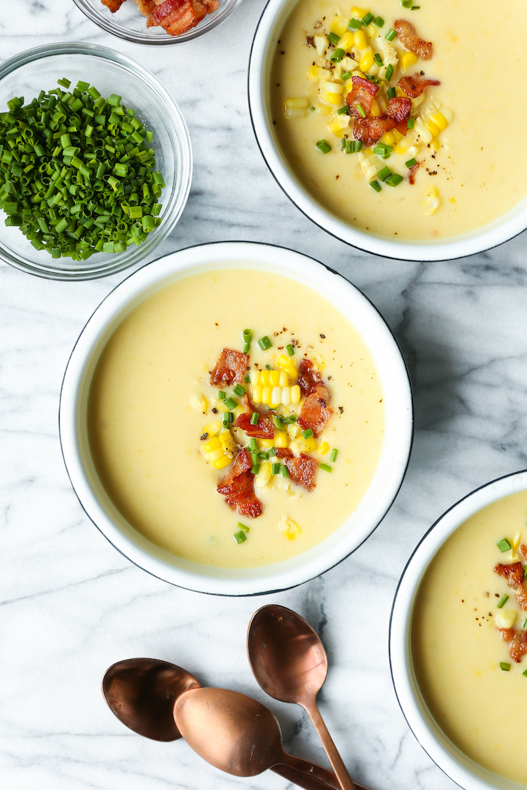 Slow Cooker Corn Chowder - The easiest crockpot soup ever! Fresh corn kernels, bacon, potato, stock, garlic, thyme. Topped with crisp bacon bits and chives. THE BEST.