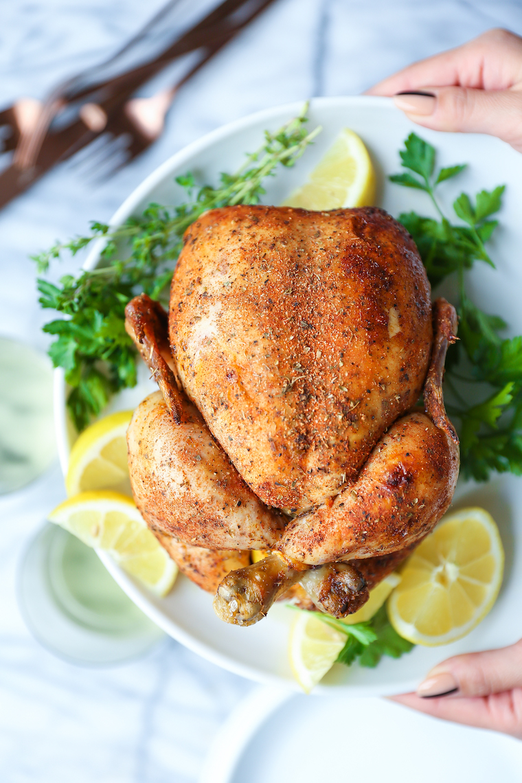 Slow Cooker Rotisserie Chicken - No more store-bought chicken! Nope, you can make this in the crockpot with only 15 min prep. So tender, moist and juicy!
