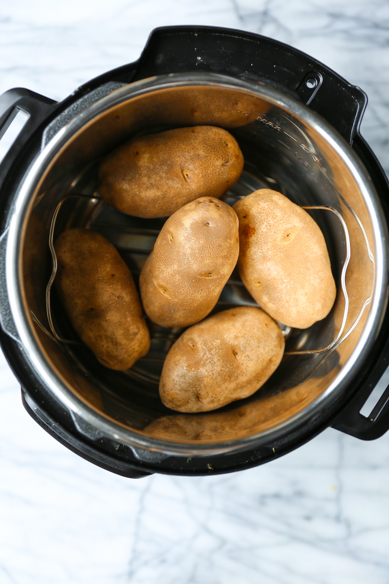 Instant Pot Baked Potato - The most foolproof way to make baked potatoes! Fluffy, fork-tender insides with super golden, crisp skin in just half the time!