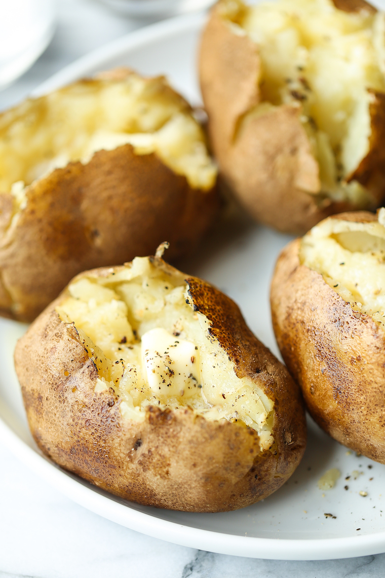 Instant Pot Baked Potato - The most foolproof way to make baked potatoes! Fluffy, fork-tender insides with super golden, crisp skin in just half the time!