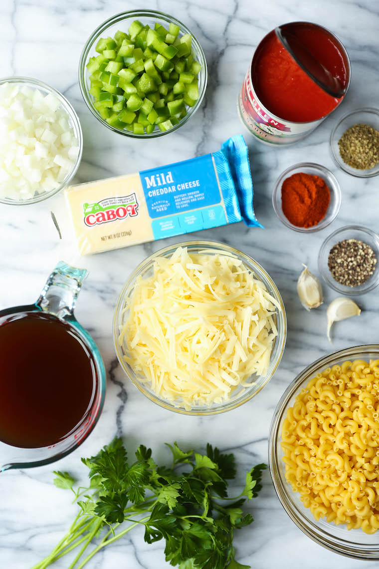 Instant Pot Cheeseburger Mac and Cheese - Cheeseburger macaroni? YES, PLEASE! Hamburger meat, pasta and an epic cheese sauce. All made in ONE POT. Too easy!