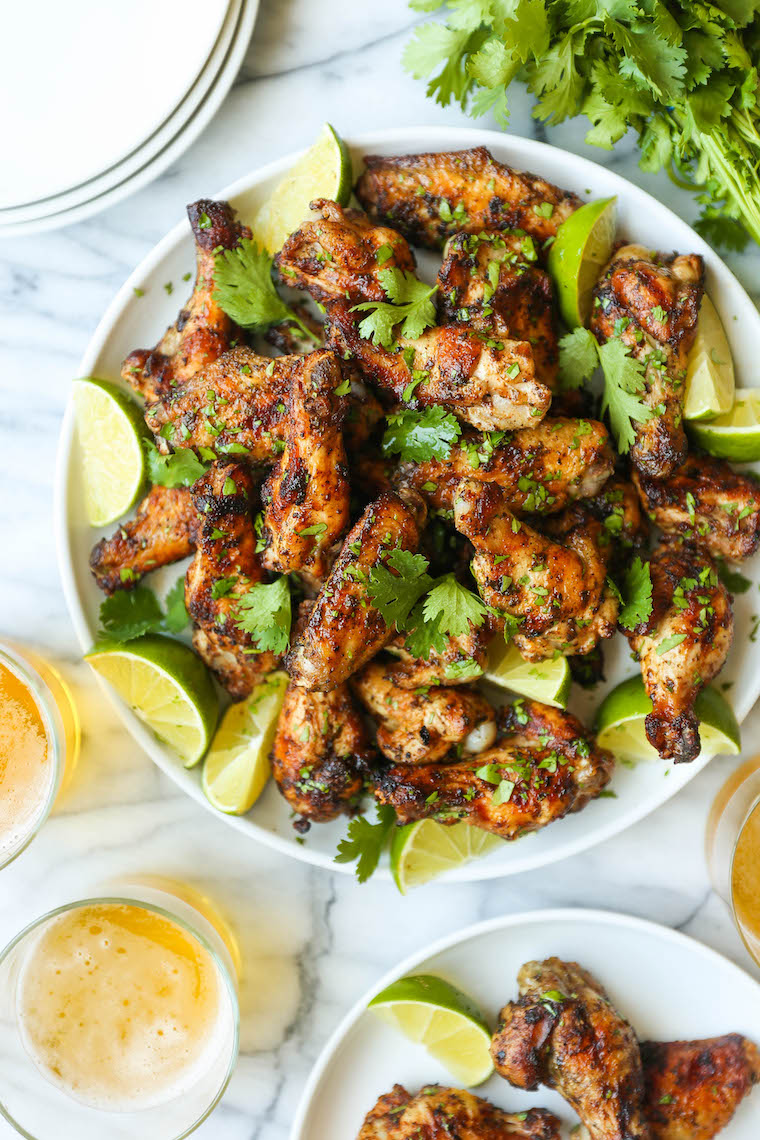 Cilantro Lime Chicken Wings - Oh-so-perfectly crispy, charred + smoky with the easiest marinade. Cilantro, lime, cumin, chili powder. So simple yet so good!