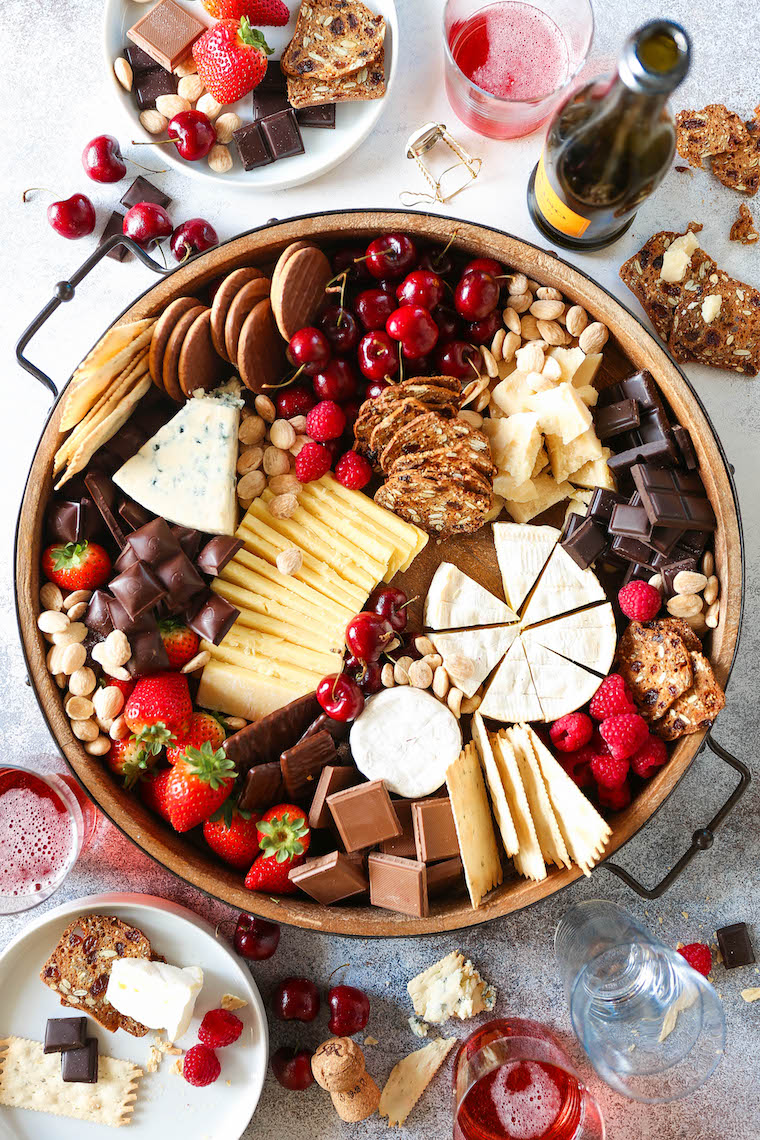 Chocolate and Cheese Board - Dark chocolate, cheeses, crackers, cherries + fresh berries. The most epic dessert cheese board for any date or get-together!