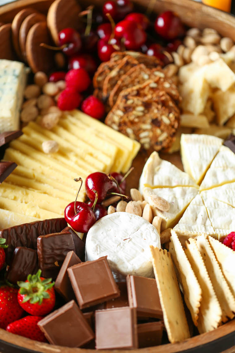 Chocolate and Cheese Board - Dark chocolate, cheeses, crackers, cherries + fresh berries. The most epic dessert cheese board for any date or get-together!