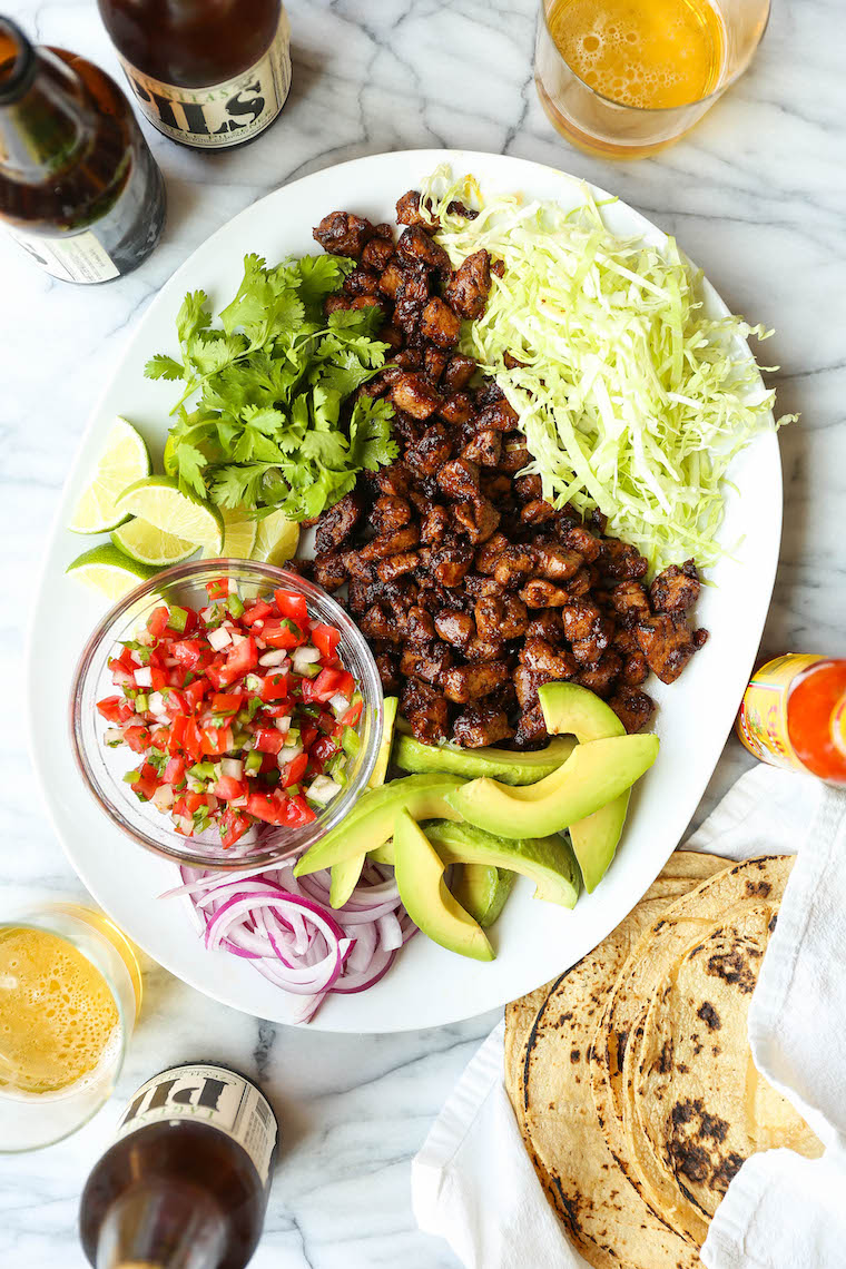 Easy Pork Carnitas - Juicy, tender pork carnitas made in 30 min, start to finish! No fuss, no hassle. Serve as tacos or burrito bowls. So easy, so so good.