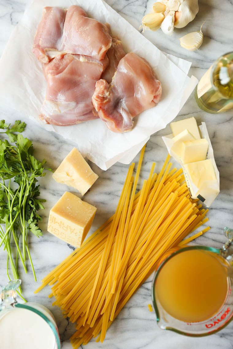 Instant Pot Chicken Alfredo - A one pot, no fuss, no babysitting dinner! Even the uncooked pasta cooks right in the IP, soaking up all that creamy goodness!