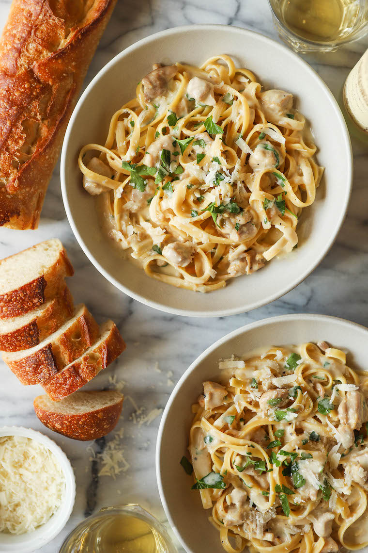 Instant Pot Chicken Alfredo - A one pot, no fuss, no babysitting dinner! Even the uncooked pasta cooks right in the IP, soaking up all that creamy goodness!