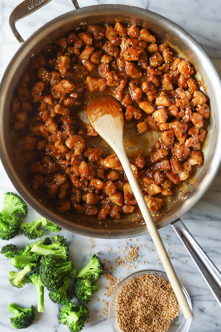 Sesame Chicken Bowls - Super saucy, crisp-tender sesame chicken! 1000x better than takeout, made in 30min or less. Serve with rice and broccoli. SO SO GOOD.