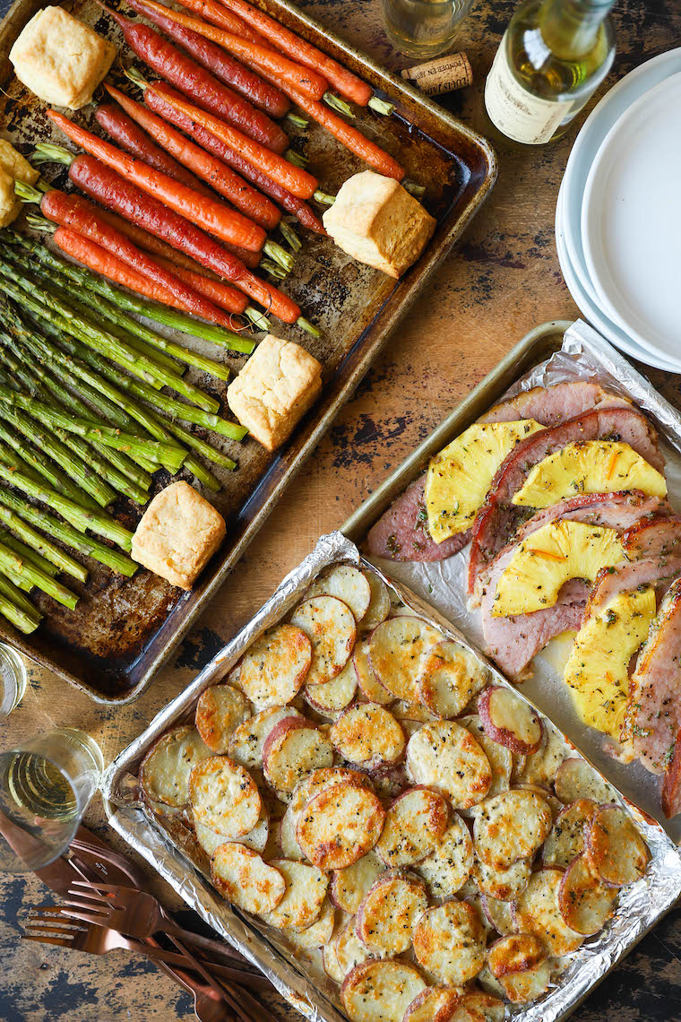 Sheet Pan Easter Dinner - Pineapple ham, scalloped potatoes, lemon garlic asparagus, honey roasted carrots, and fluffy mile-high biscuits on TWO SHEET PANS!