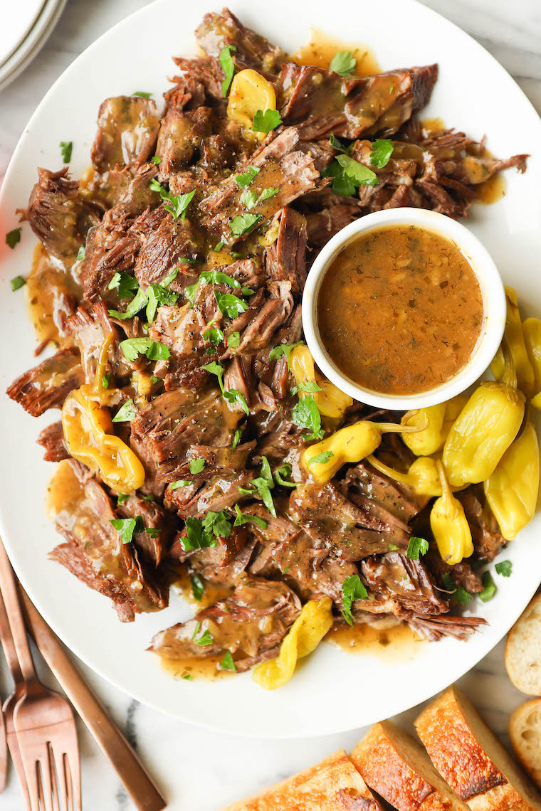 Instant Pot Mississippi Pot Roast - The most amazing pot roast ever! Made in the IP in just a fraction of the time. So juicy and melt-in-your-mouth tender!