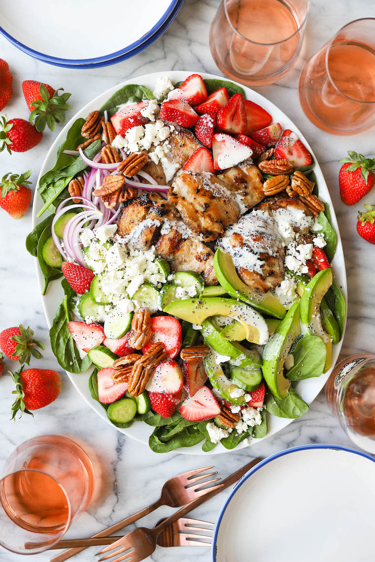 Strawberry Spinach Salad - A crowd favorite! Loaded with baby spinach, fresh strawberries, juicy, tender chicken thighs + the dreamiest poppy seed dressing!