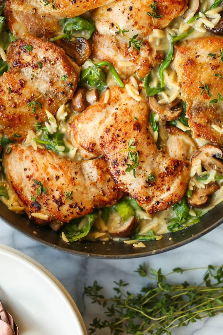 One Pot Chicken and Mushroom Orzo - Amazingly creamy orzo with juicy chicken, mushrooms and baby spinach. All made in one skillet, even the uncooked pasta!